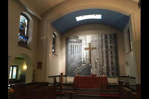 Mural at the east end of Christ Church Southwark, depicting the cross in the thick of a densely urban scene